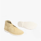 Popps PASTEL Womens Suede Casual Desert Boots in Mellow Yellow, pair with one boot turned to show the white sole
