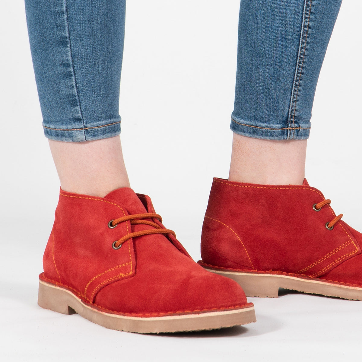 Roamers ORIGINAL Unisex Desert Boots in Red, worn with blue jeans