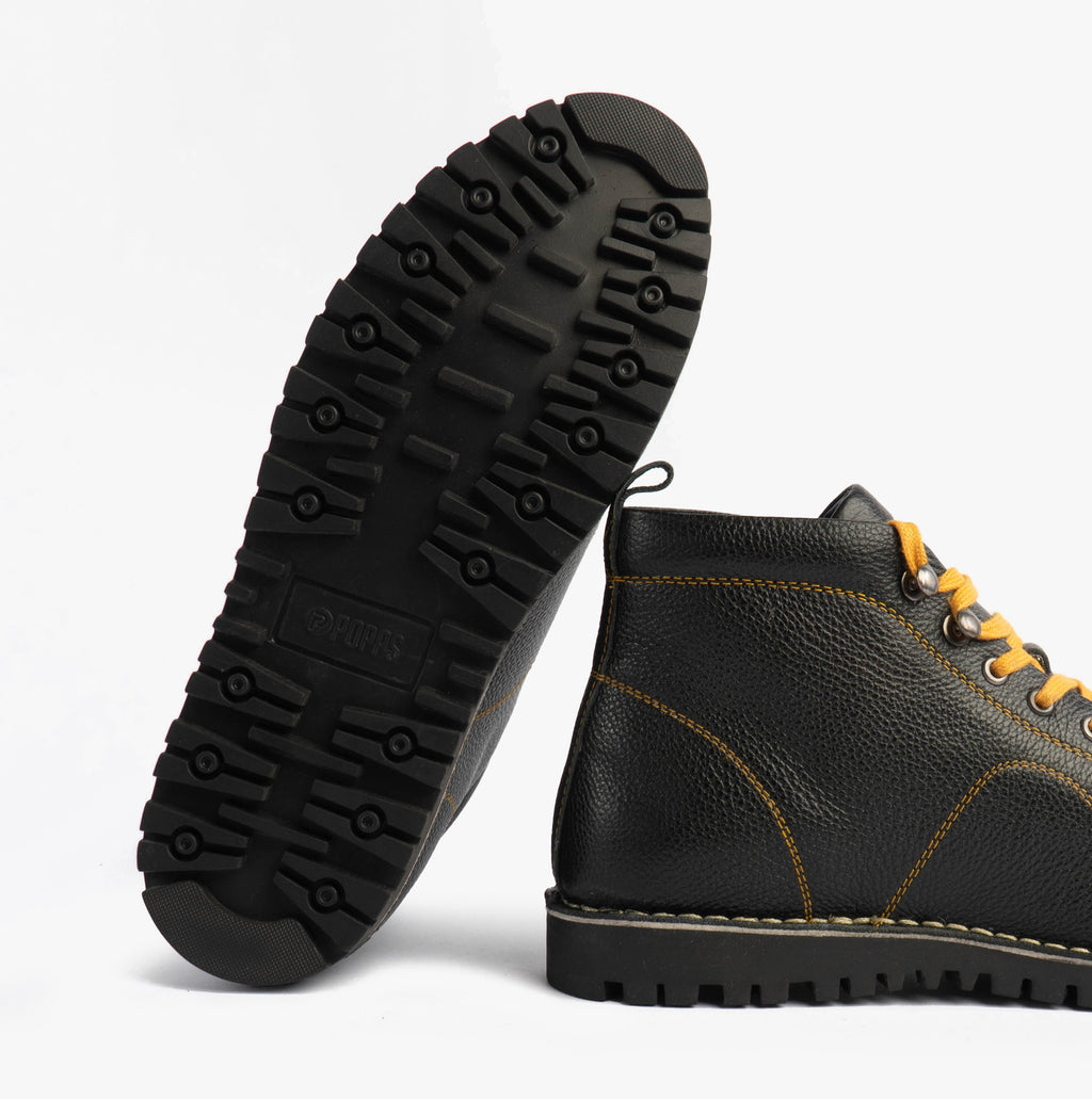 Popps 1961 MOD Mens Leather Monkey Boots in Black, one boot turned to show the tread sole