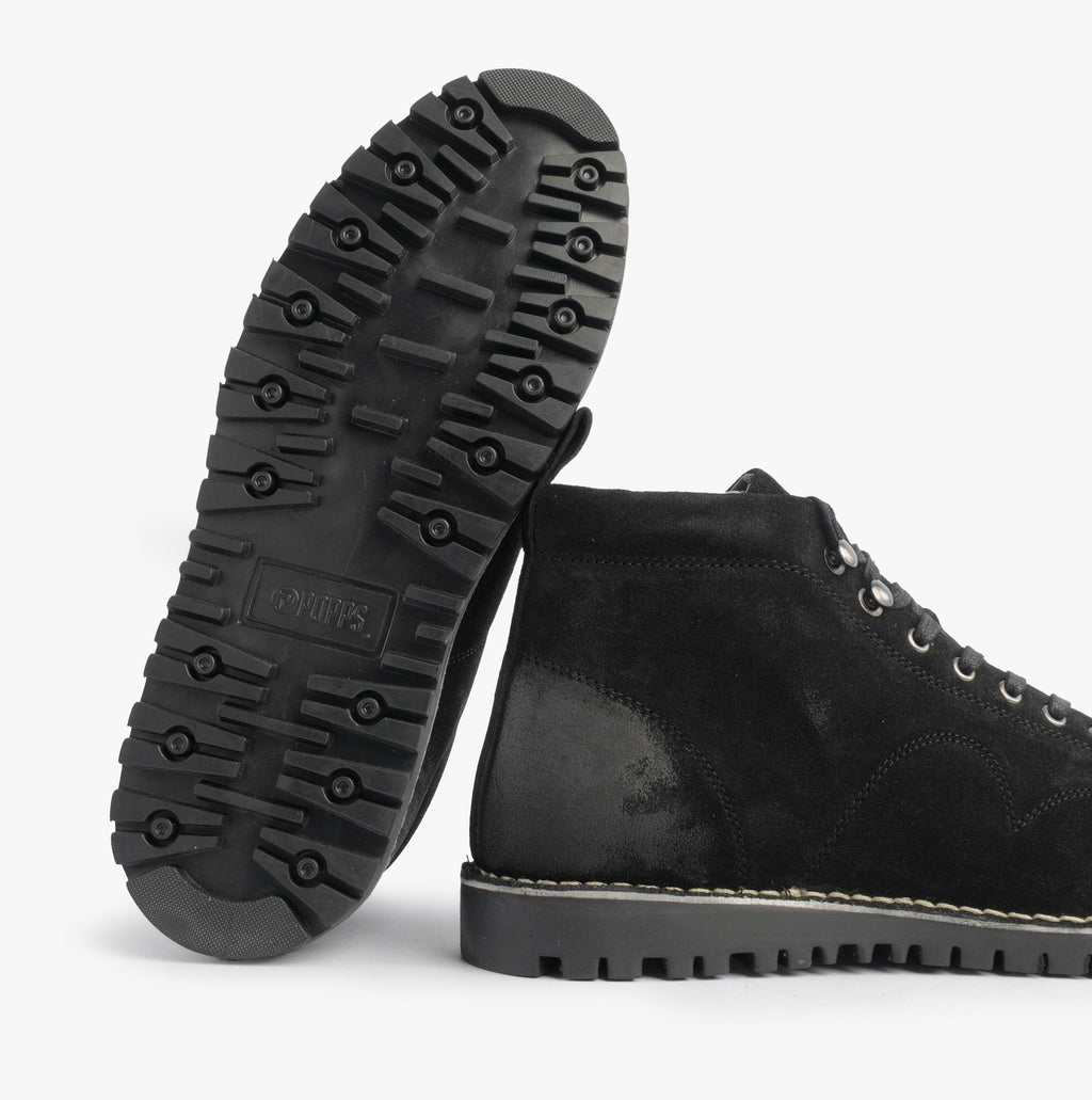 Popps 1961 MOD Mens Suede Monkey Boots in Black, one boot turned to show the tread sole