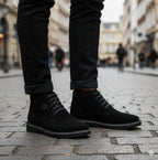 Popps RANGER Mens Desert Boots in Black, worn with black jeans on a cobbled street