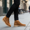 Popps RANGER Mens Desert Boots in Cognac, worn with black jeans on a pavement