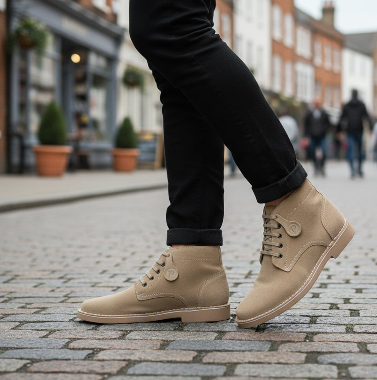 Popps RANGER Mens Desert Boots in Taupe, worn with black jeans on a cobbled street