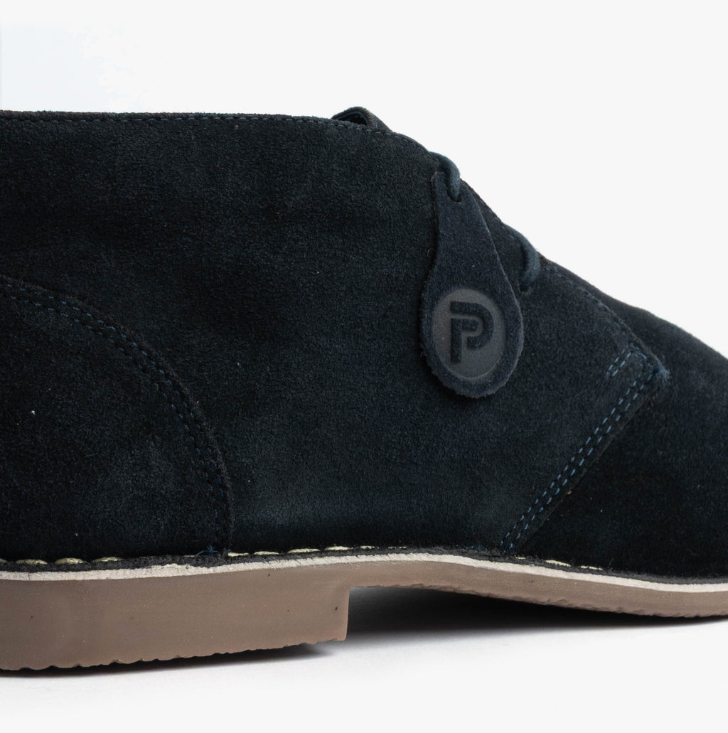 Popps VESPA Unisex Desert Boots in Navy, close-up of the round logo button