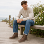 Roamers LEONARD Mens Desert Boots in Brown, worn by a man sitting on a wooden bench with blue jeans